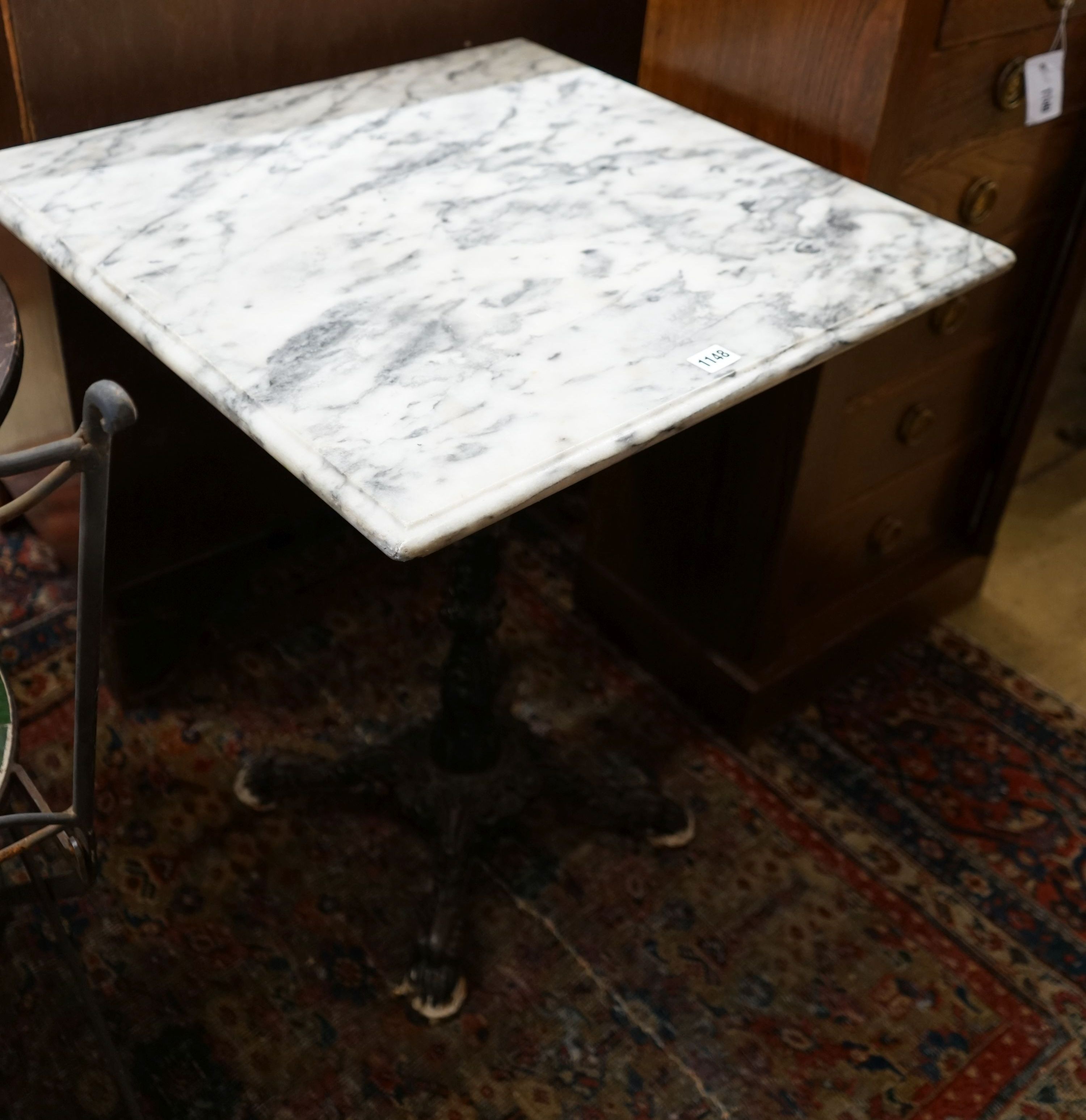 A square reconstituted marble and cast iron garden table, width 60cm height 74cm